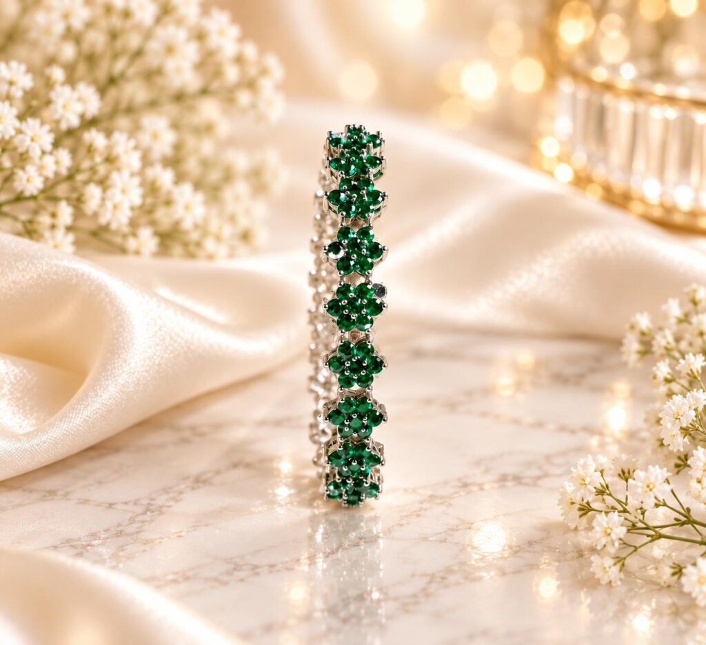 Sparkling flower shaped green stones in a sleek silver-tone finish